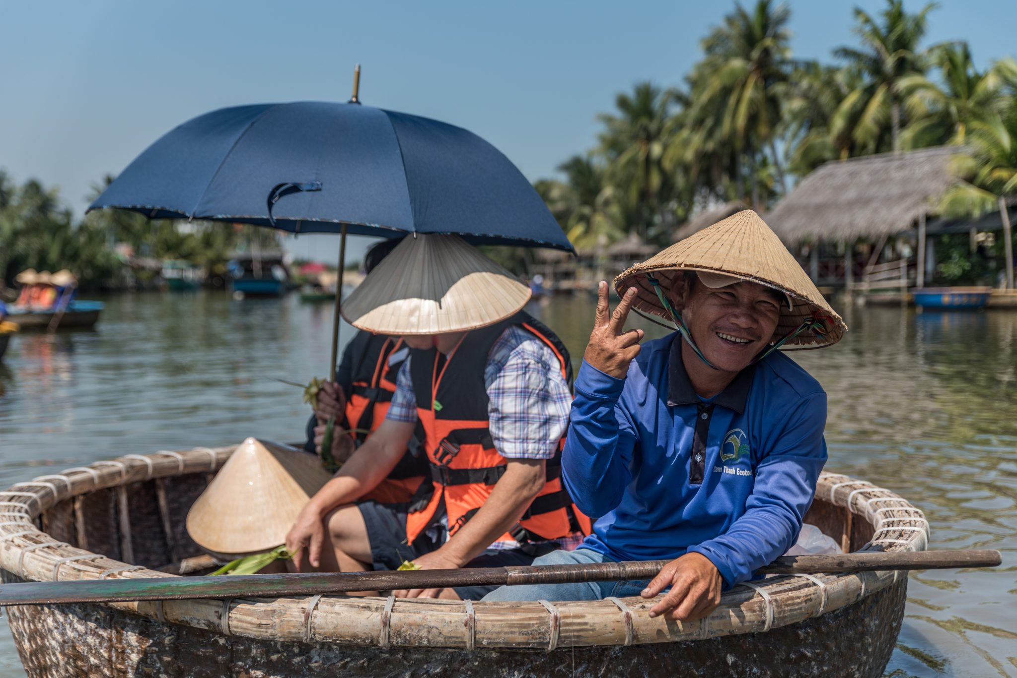 Bay Mau coconut forest guide on a boat, Hoi An, Vietnam